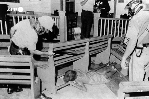 Demonstrators in a Louisiana church protest (1963) - AFP